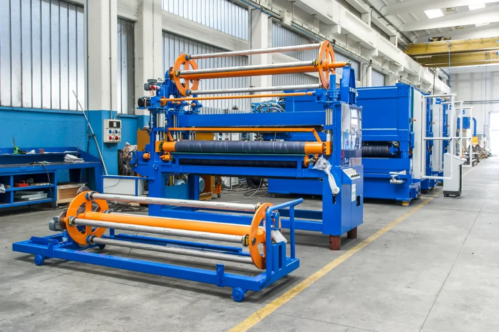 Serie di plastificatrici blu e arancioni